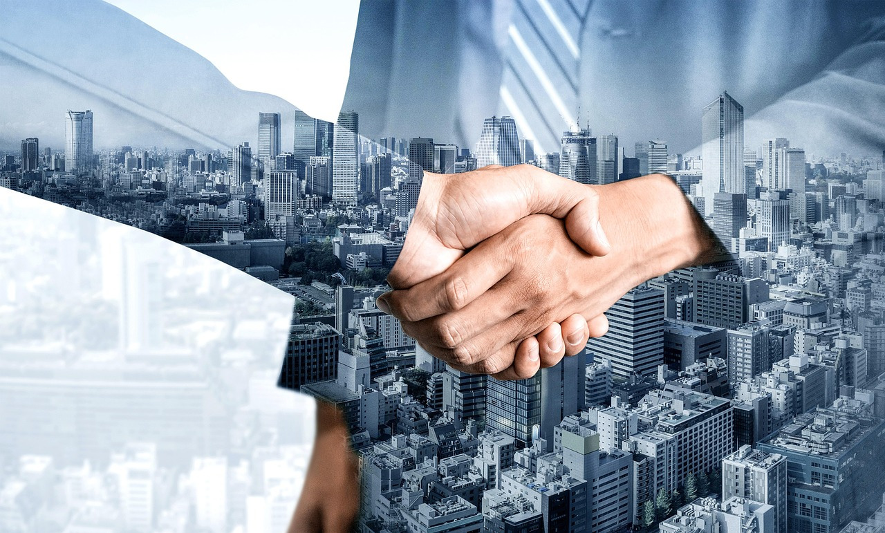 merger acquisition handshake